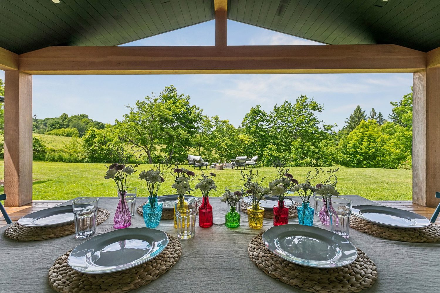 Covered porch and deck overlooking the acre and open farmland